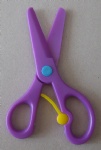 Plastic safety scissors safely cut paper